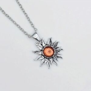 Radiant Sunburst Necklace with Orange Accent